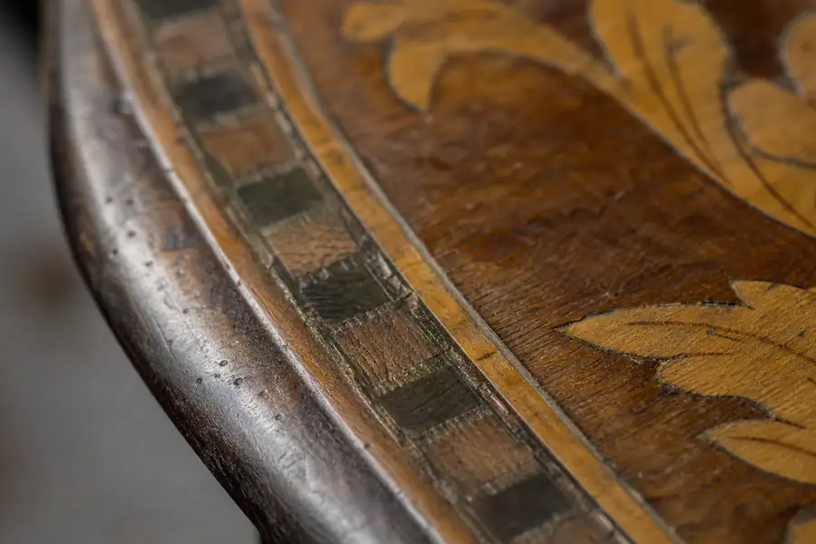 Macro of a well-kept wood inlay after years of wear
